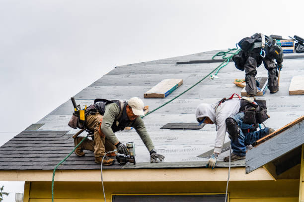 Professional Roofing technician working in Footville, WI